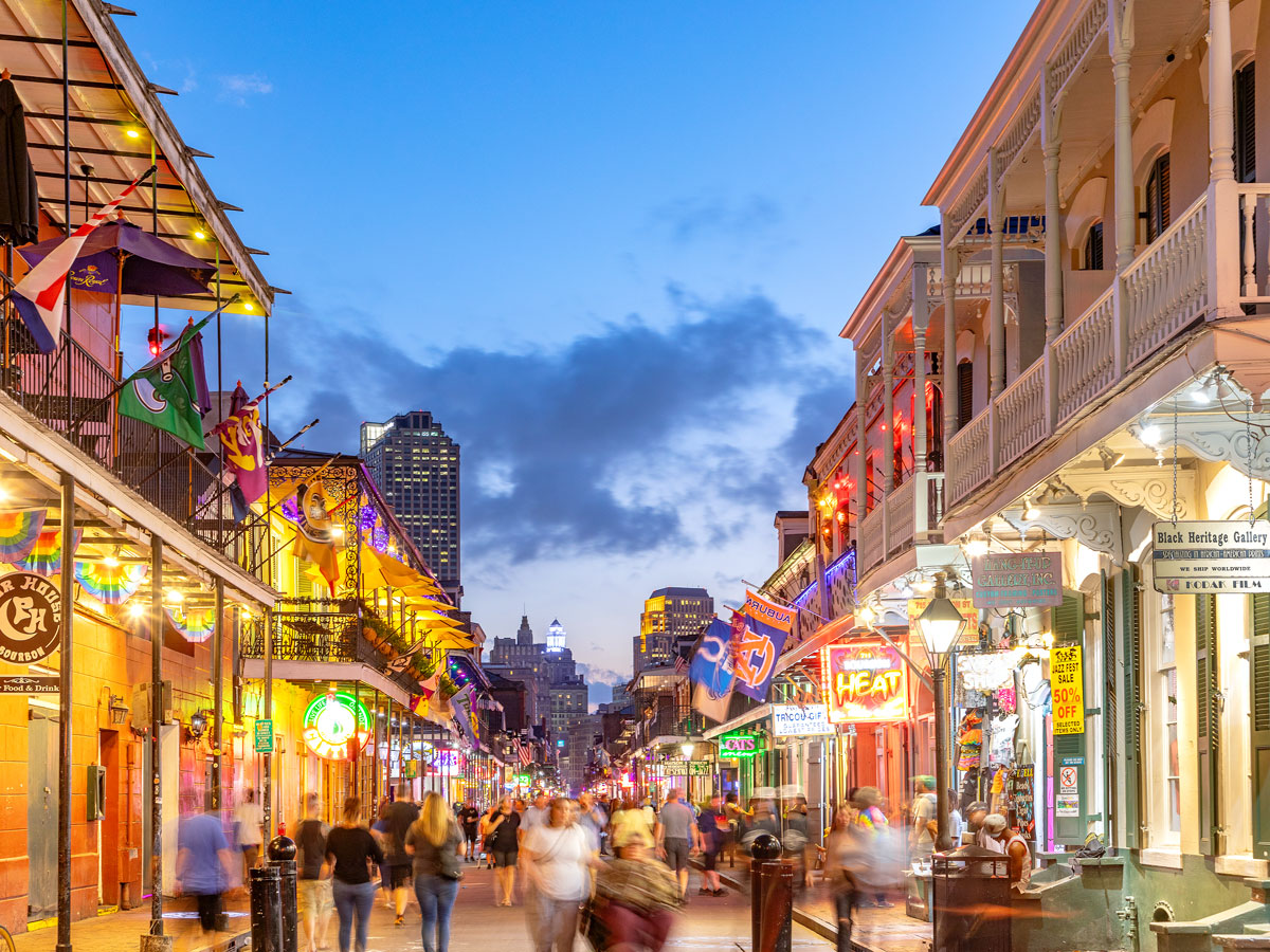 Evening crowds on Bourbon Street in New Orleans, Louisiana