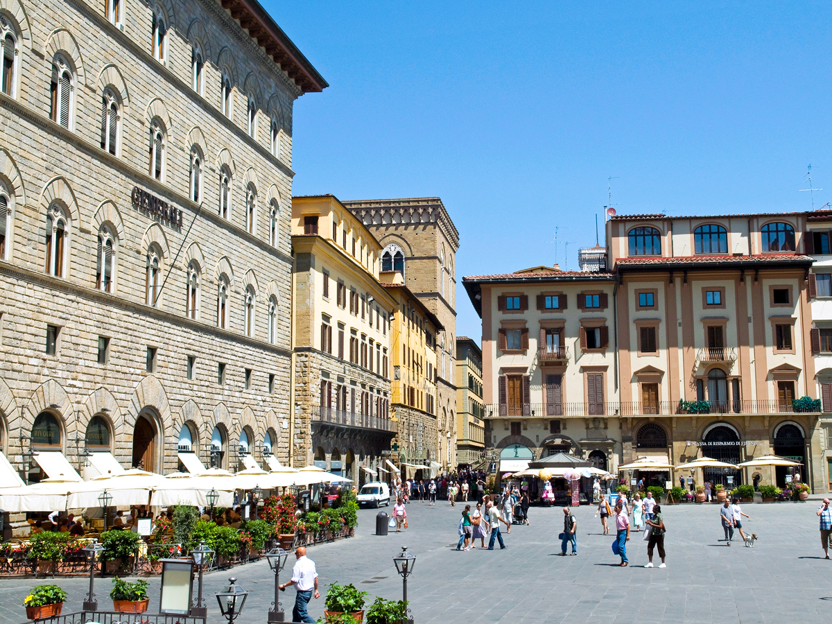 People walking through Piazza dlla Signoria in Florence, Italy