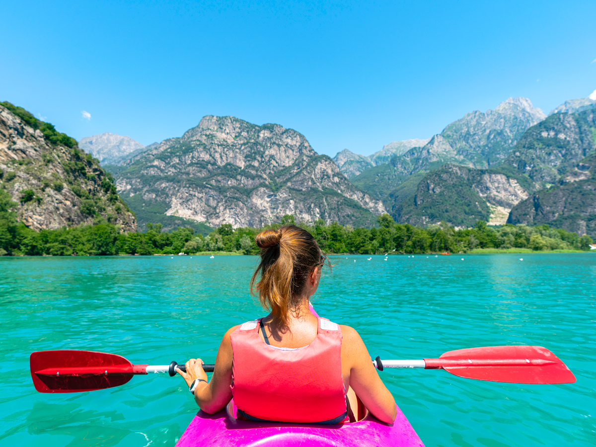 Person kayaking on Lake Como