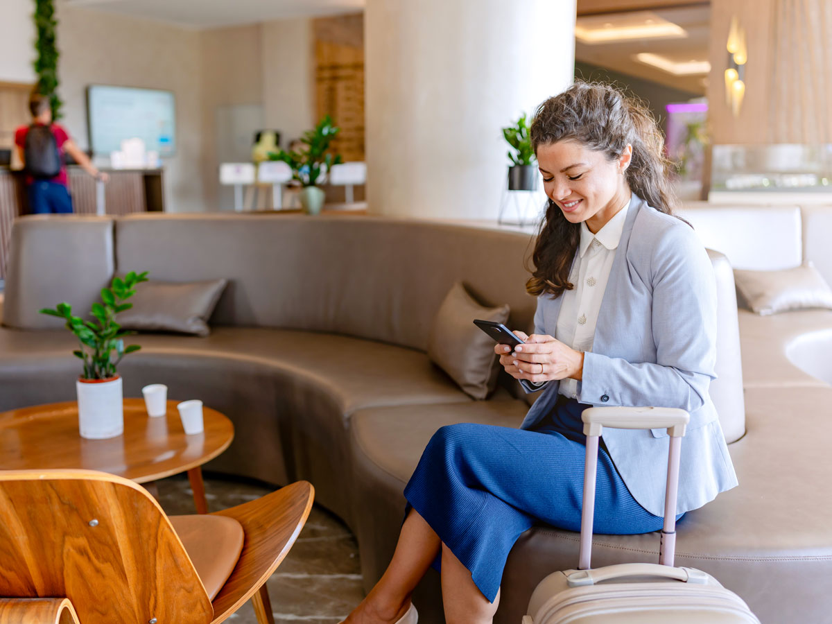 Traveler sitting in airport lounge