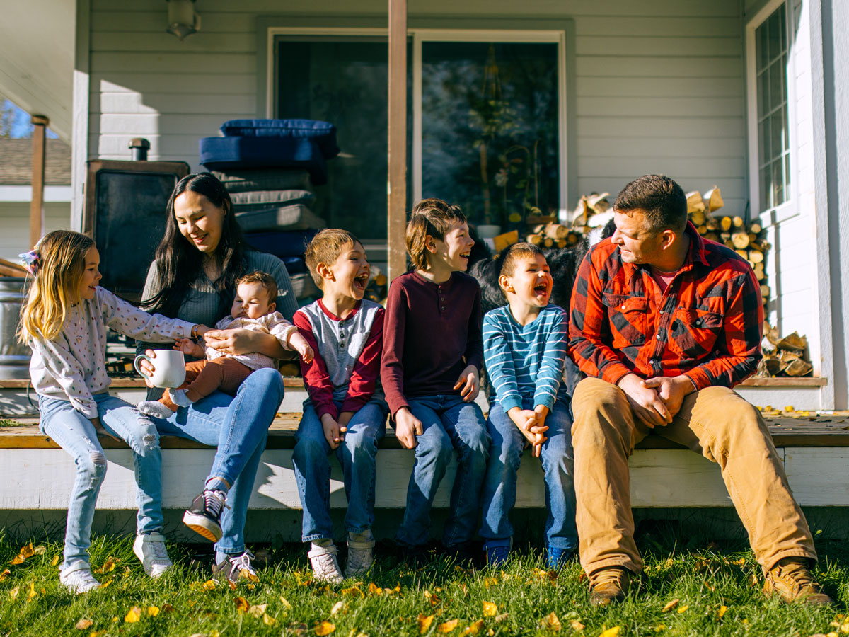 Family sitting on porch
