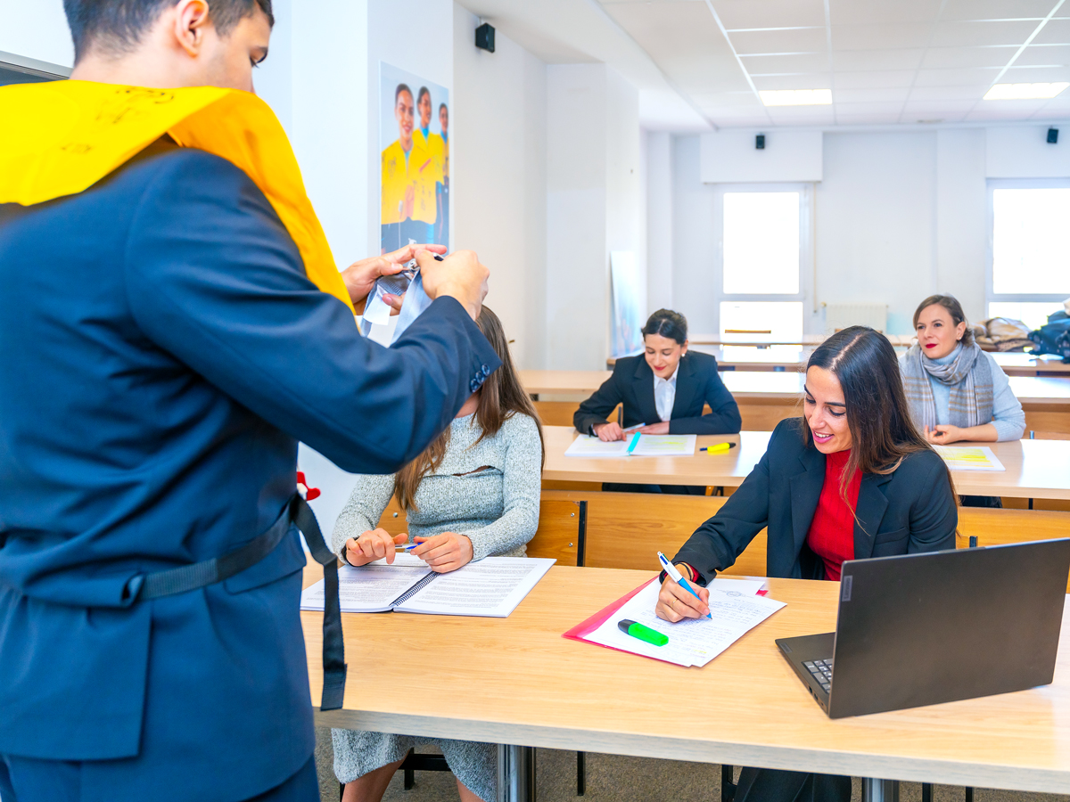 Flight attendants taking notes in training course