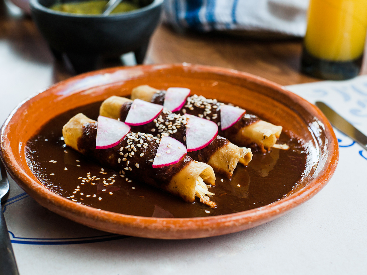 Mexican mole over enchiladas 