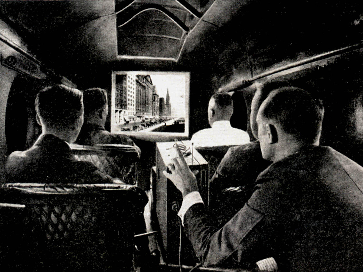 Vintage photo of projector showing in-flight movie