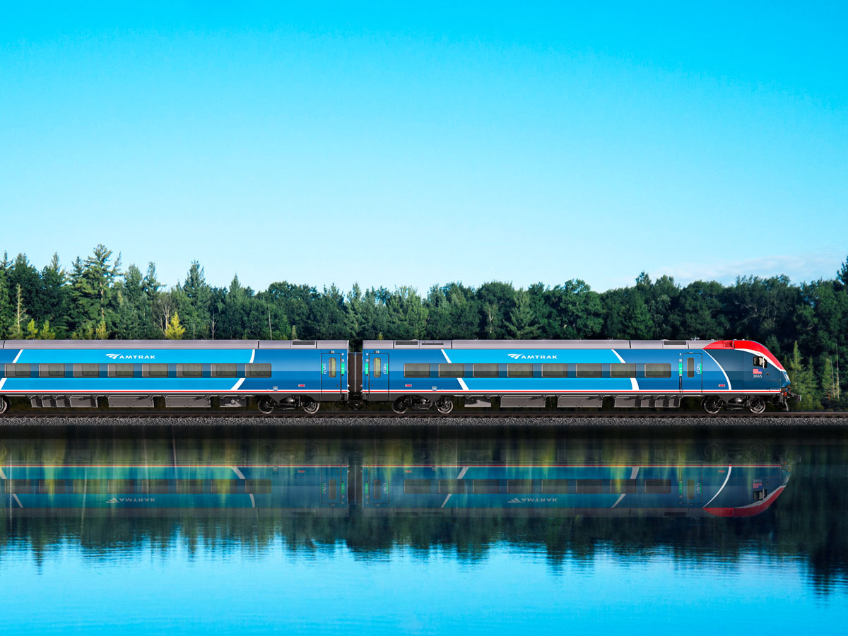 Amtrak train with reflection on lake