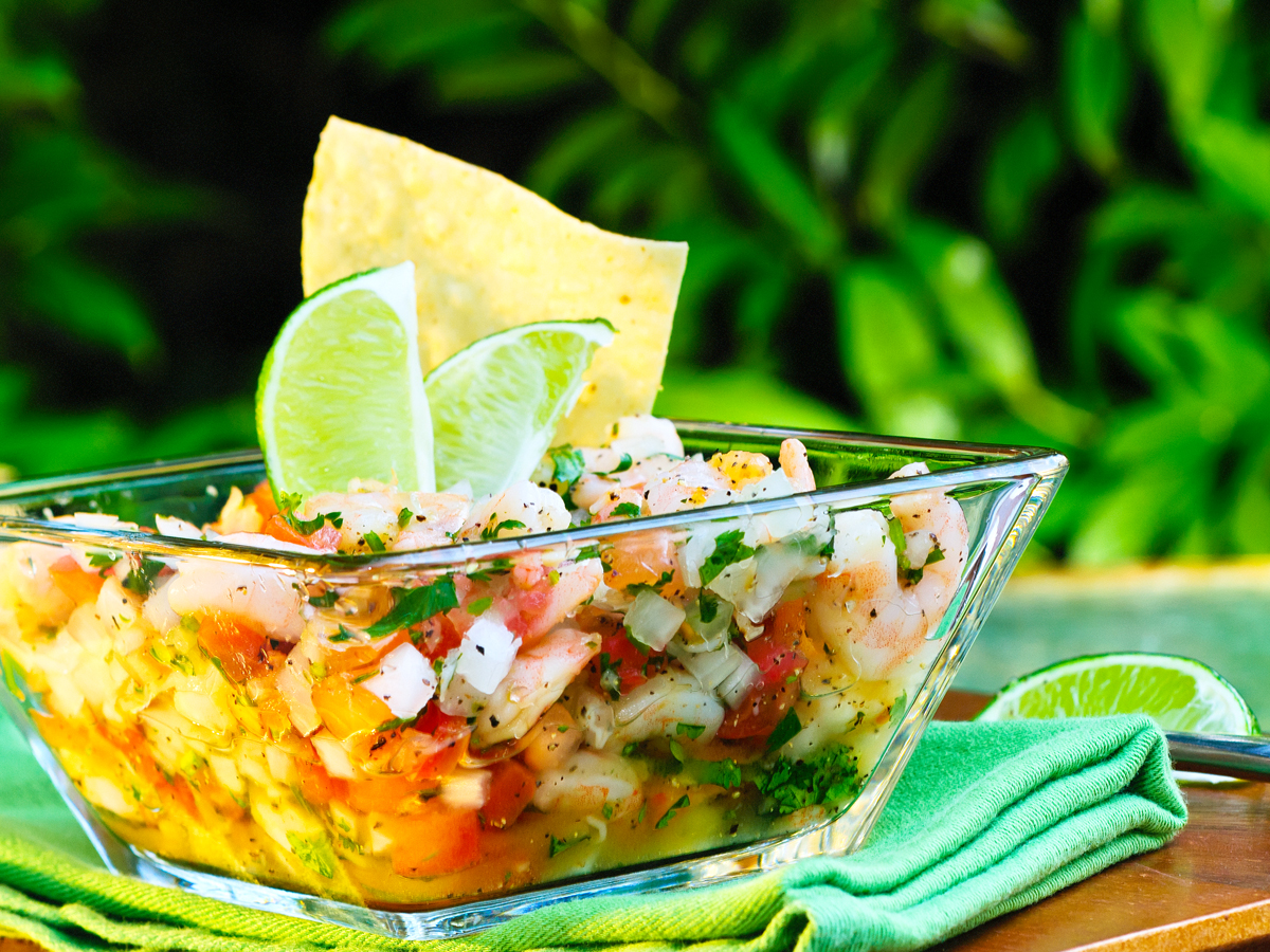 Bowl of ceviche on table outside