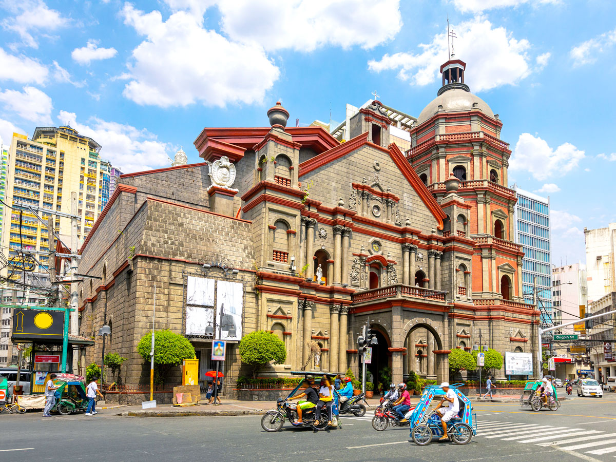 Tuk-tuks in front of Binondo Church in Manila, the Philippines