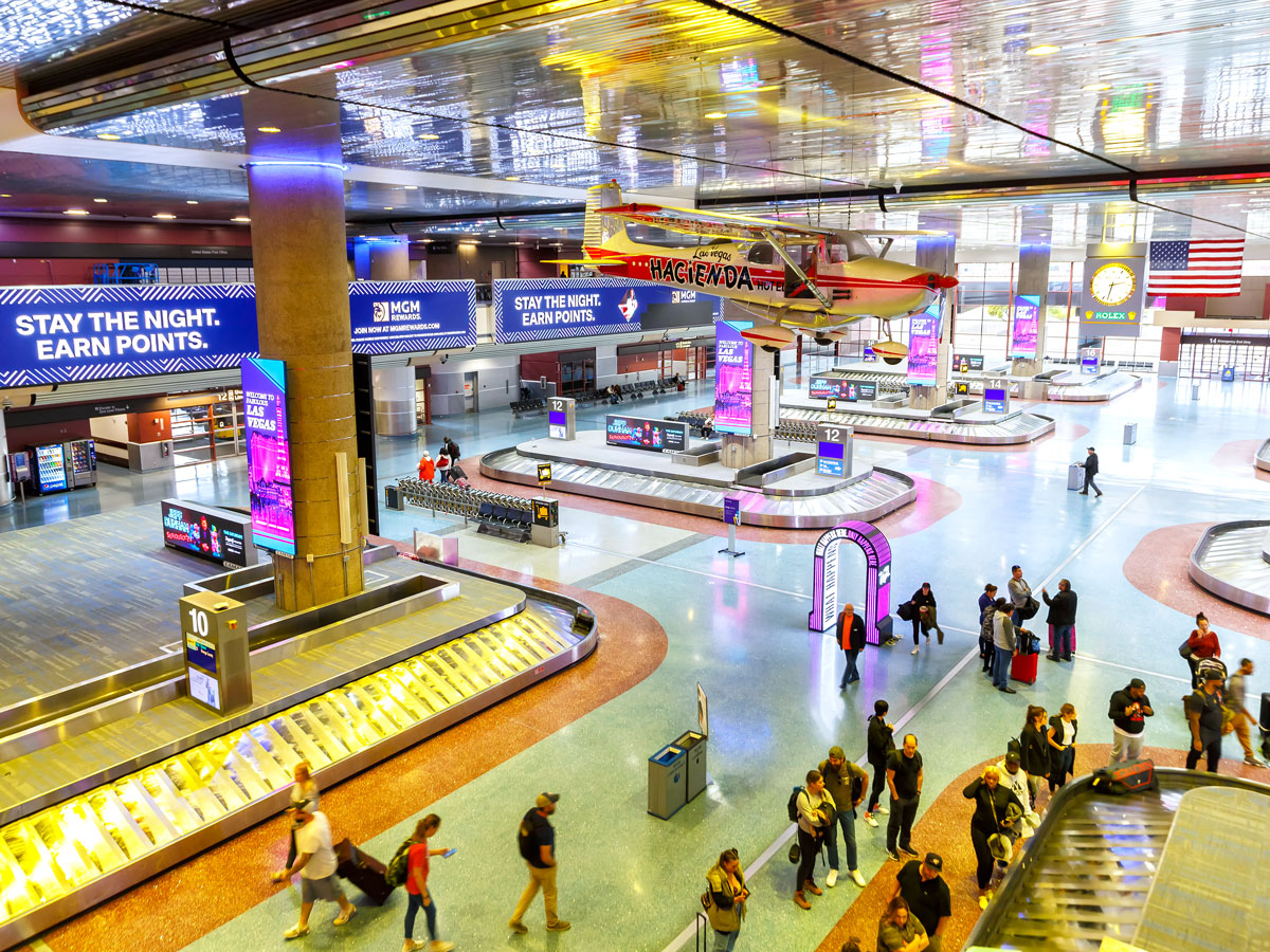Passengers waiting in baggage claim area at Las Vegas Harry Reid Airport in Nevada