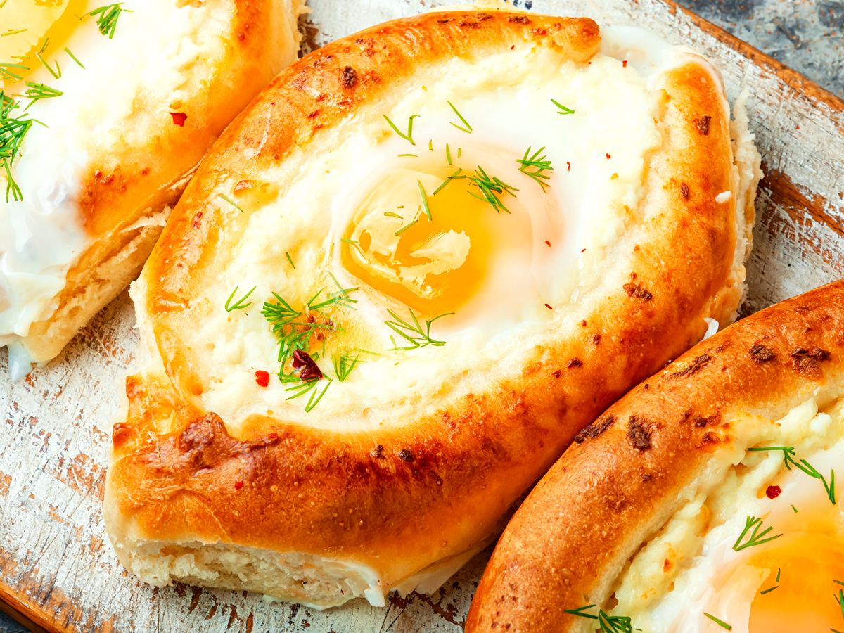 Egg- and cheese-filled khachapuri, national dish of Georgia