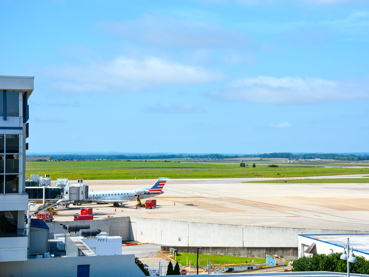 Single jet parked at gate at Huntsville International Airport in Alabama