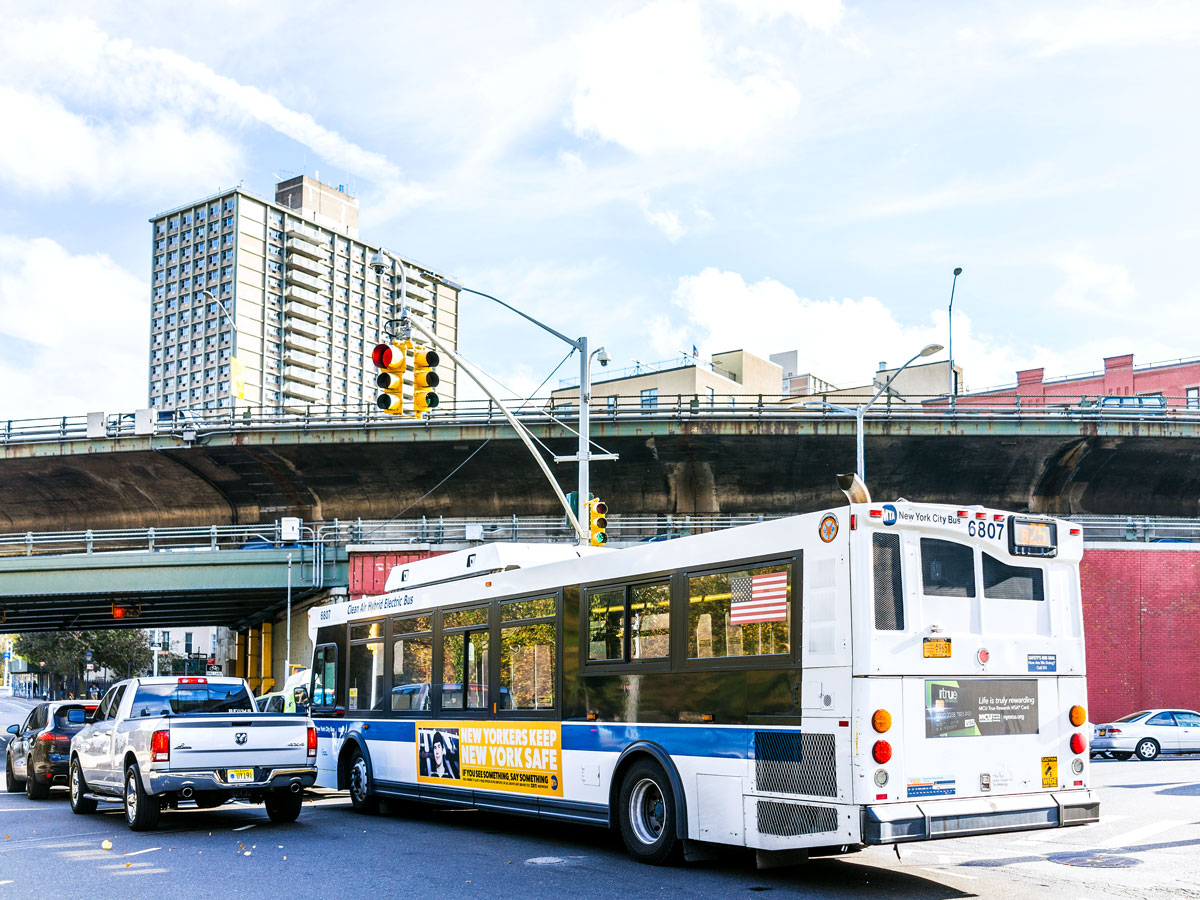 MTA bus in traffic on NYC street