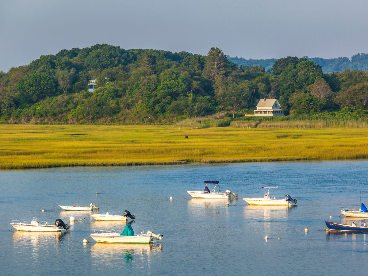 Boats floating off coast of Ipswich, Massachusetts