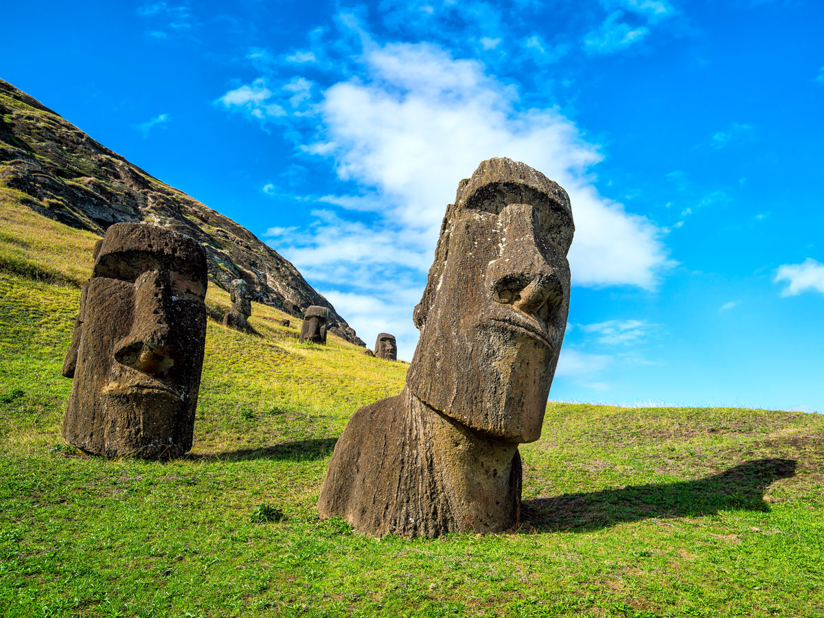 Giant half-buried Moai statues on Easter Island
