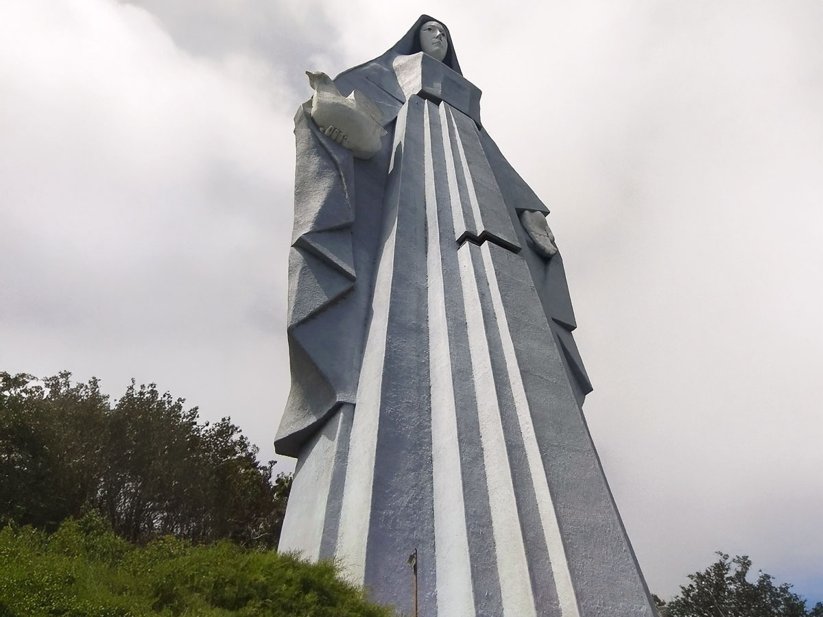 Looking up at the Monumento a la Virgen de la Paz statue in Venezuela