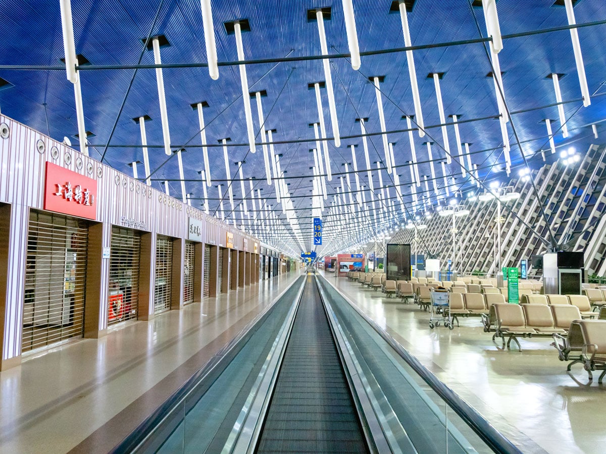 Moving walkway and gate seating areas at Shanghai Pudong Airport
