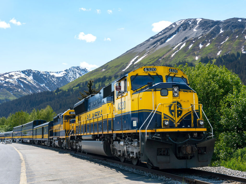 The Alaska Railroad on track through mountainous terrain