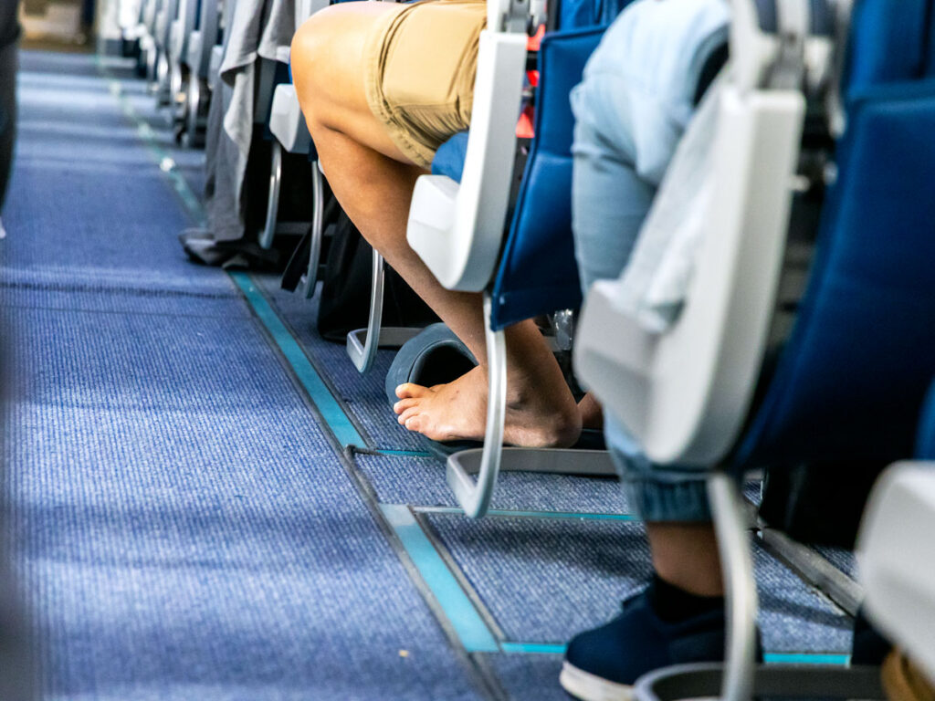 Close-up shot of airline passengers' feet