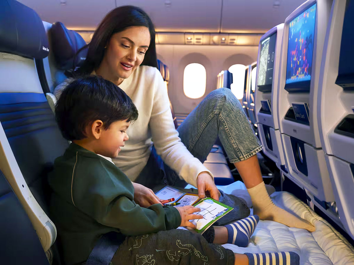 Mother and child lounging in United Relax Row
