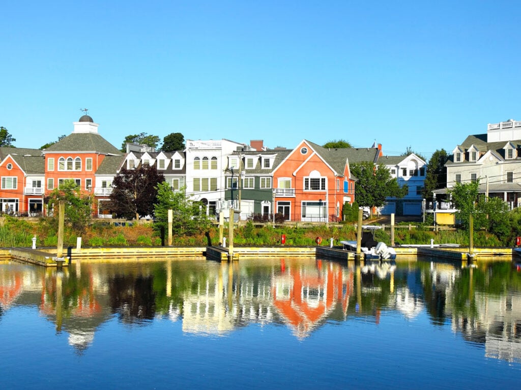 Homes reflecting on water in Devon, Connecticut