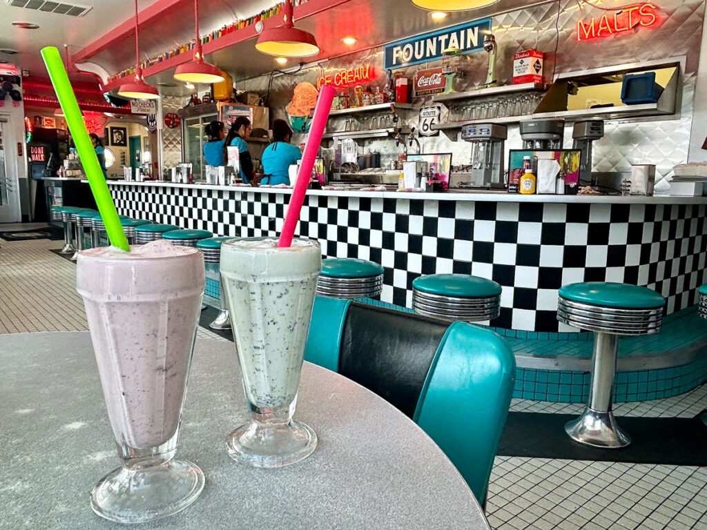 Milkshakes on table inside Albuquerque's 66 Diner